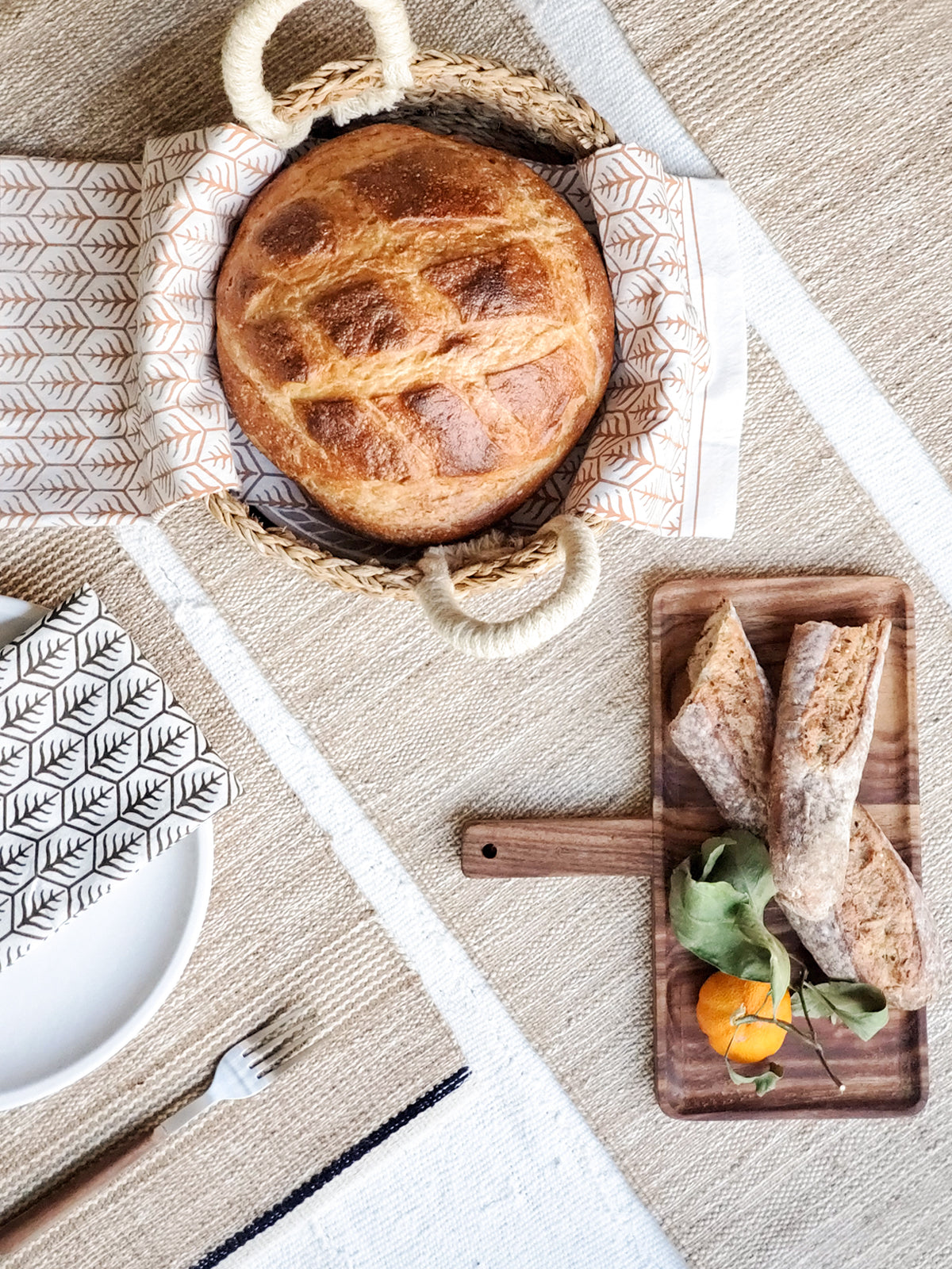 jute table runner styled with bred board and basket 